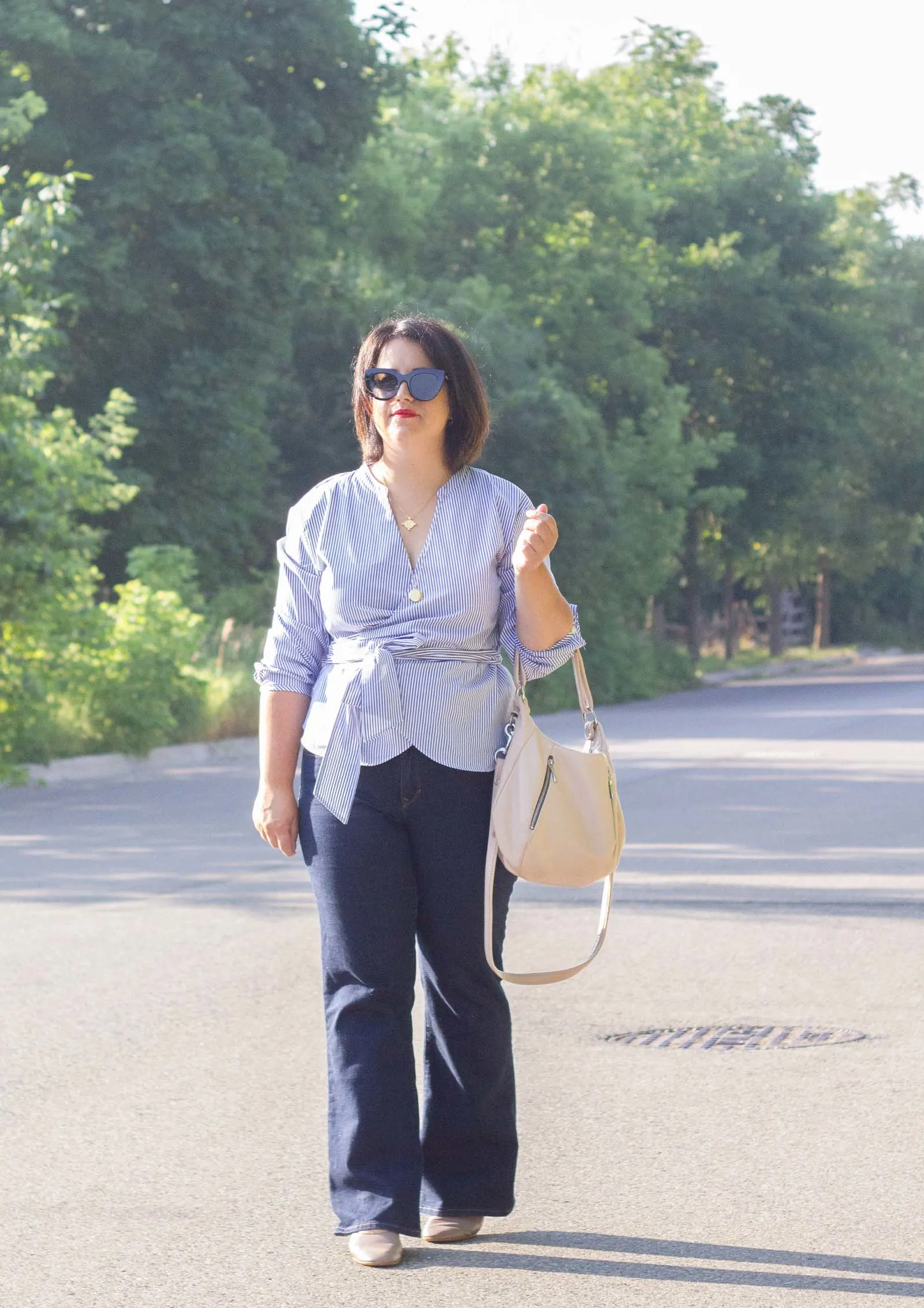 wrap top and jeans outfit