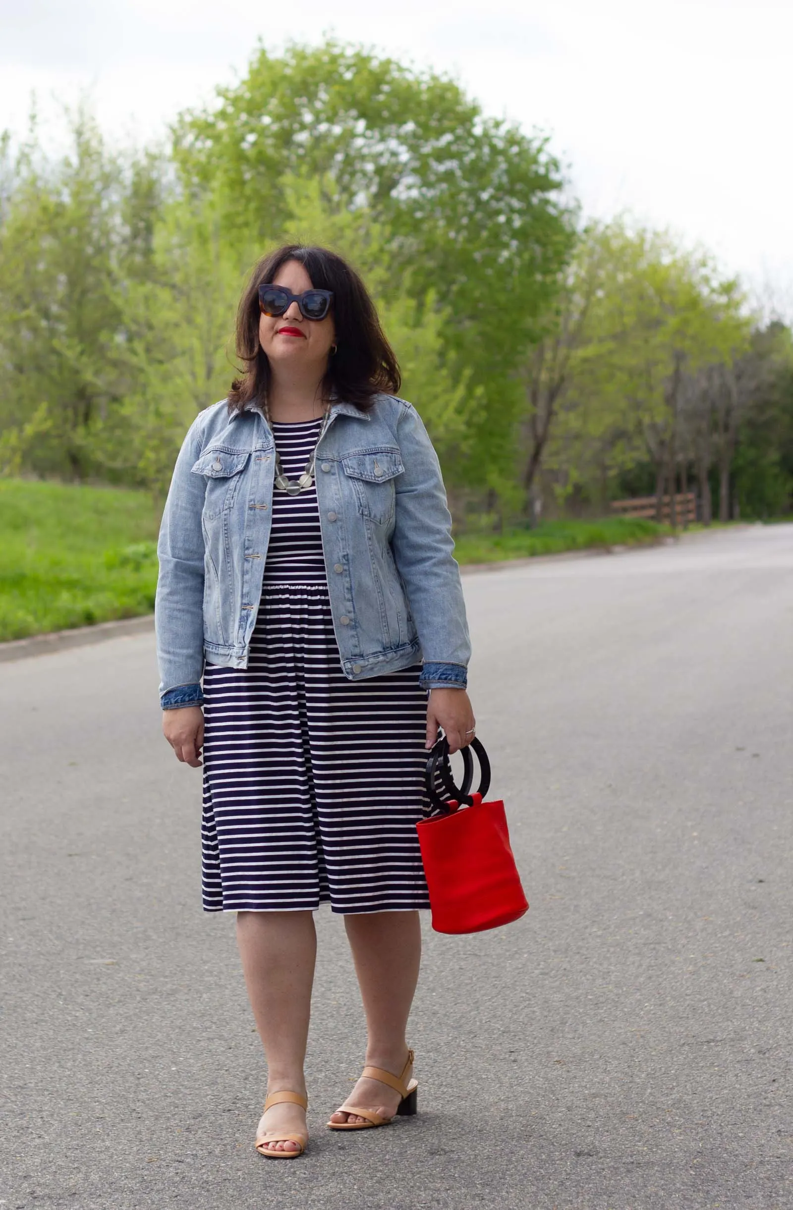 stripe dress worn with jean jacket, simon miller bag and neutral heels