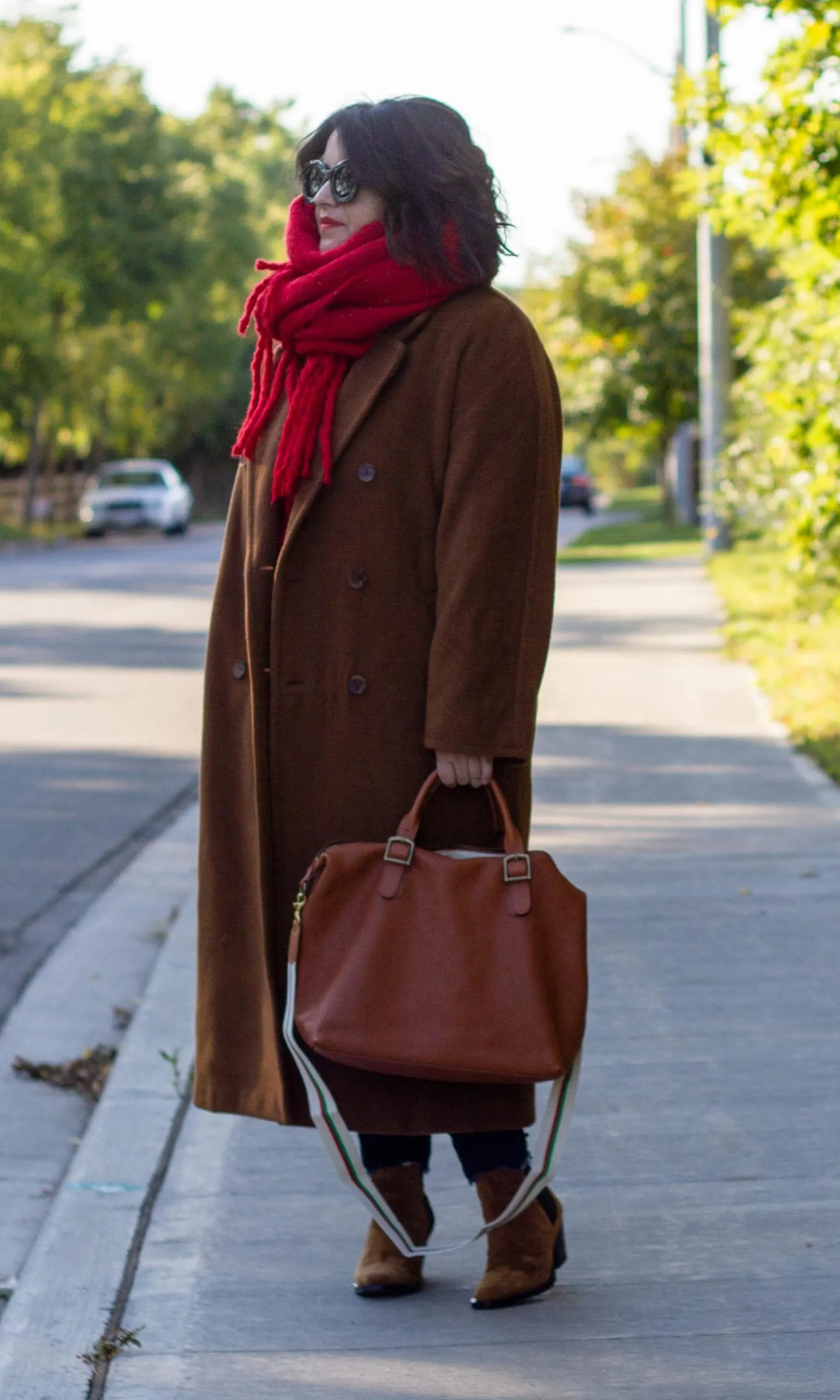 deep camel coat aritzia, pop of red