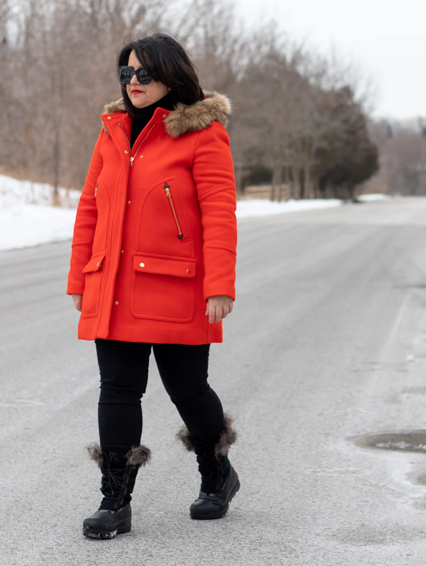 red coat black outfit