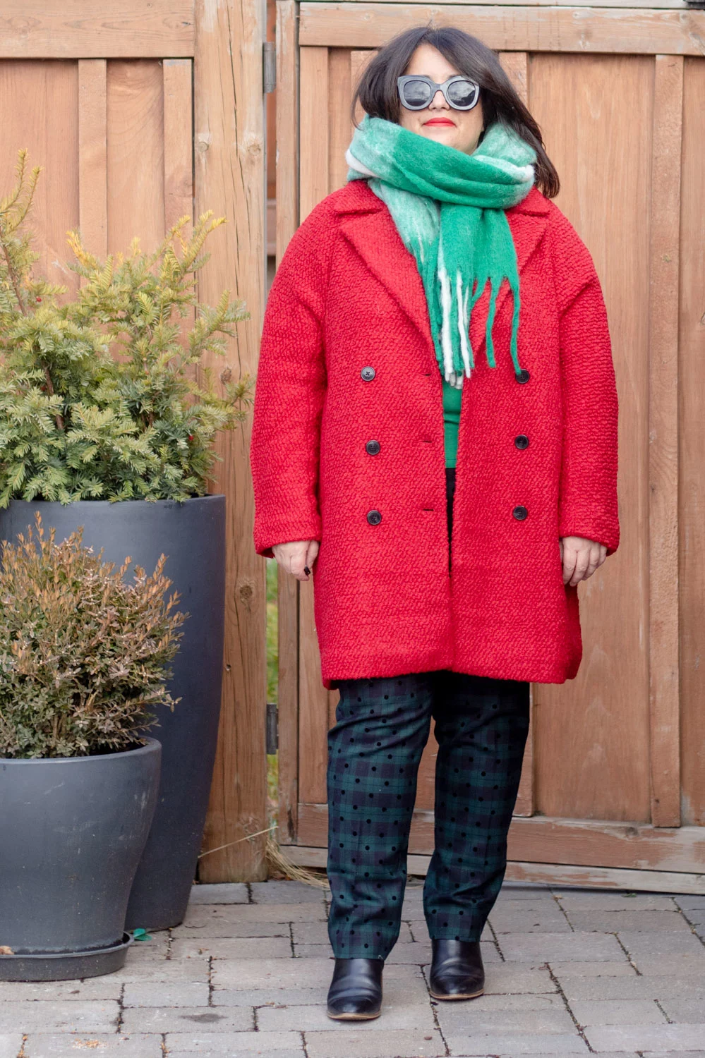 red coat, black watch plaid pants