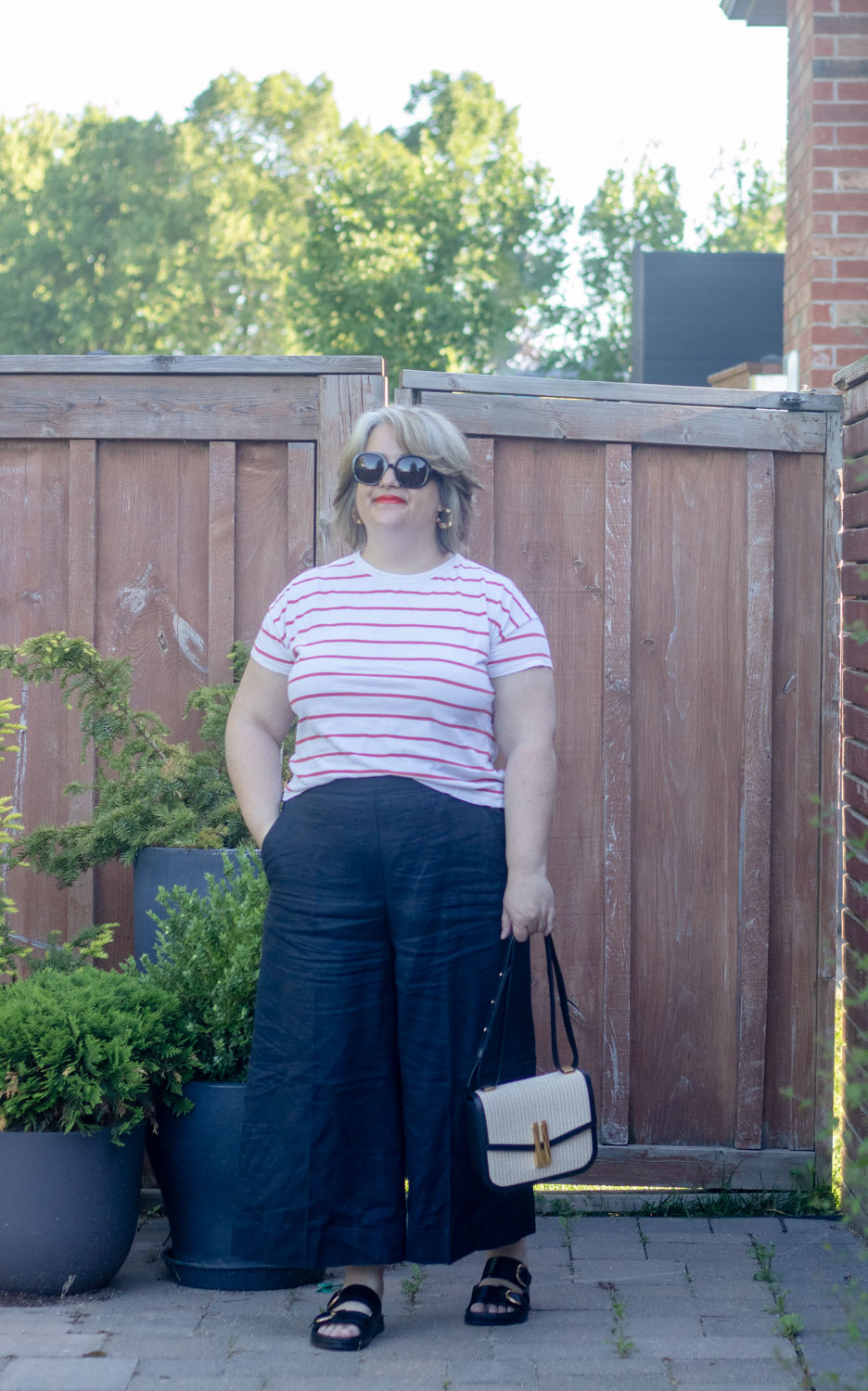 linen culottes outfit with stripe shirt and two strap sandals