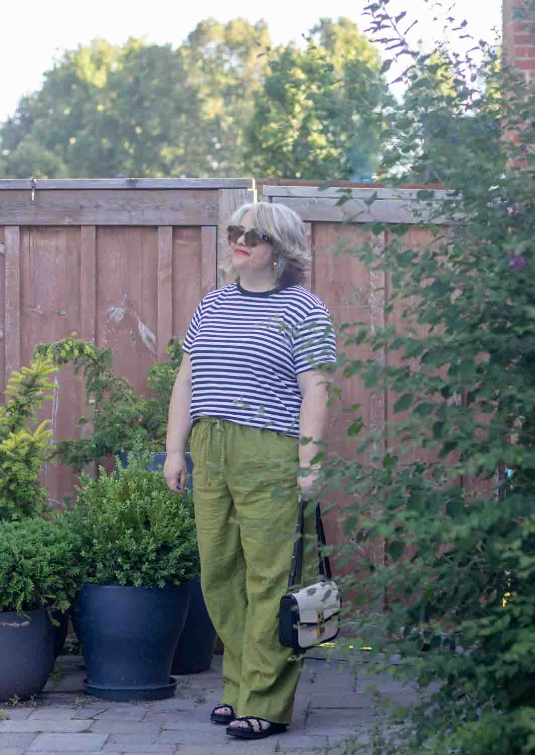 green drawstring linen pants outfit with stripes