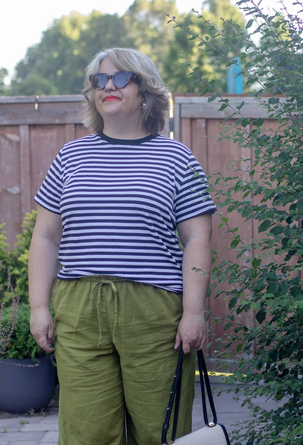 green linen pants outfit with stripes