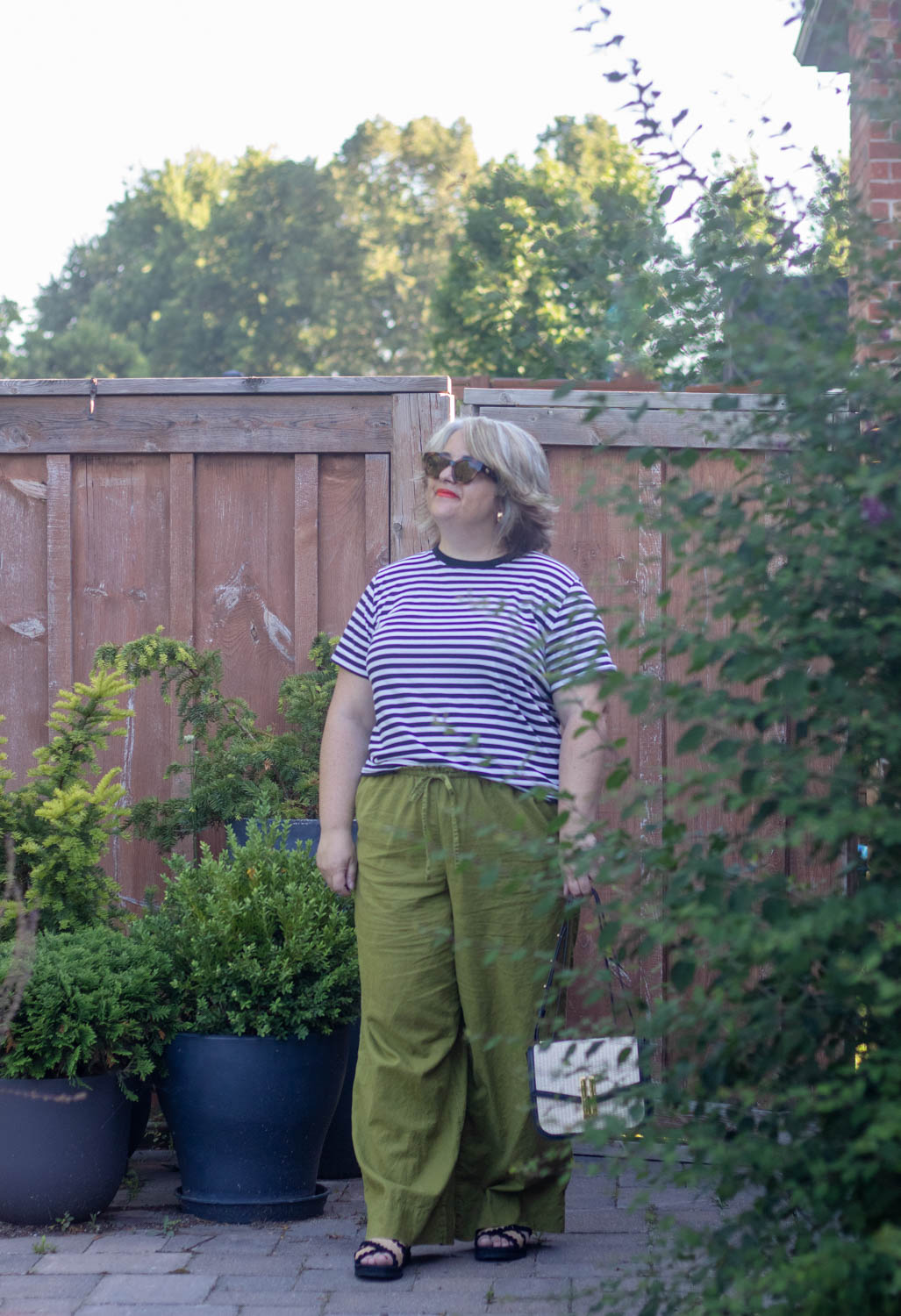 green linen pants outfit with stripes