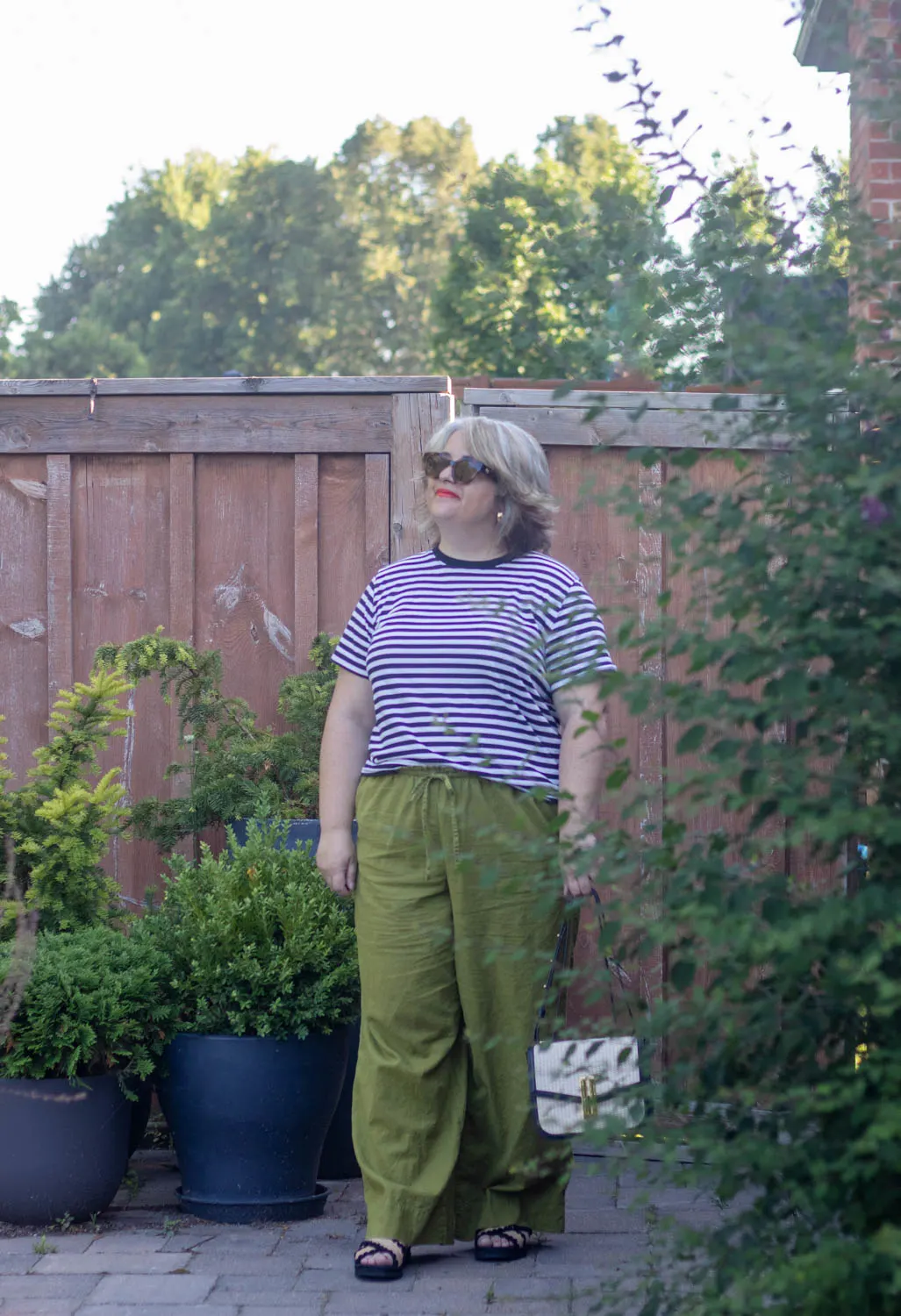 green linen pants outfit with stripes