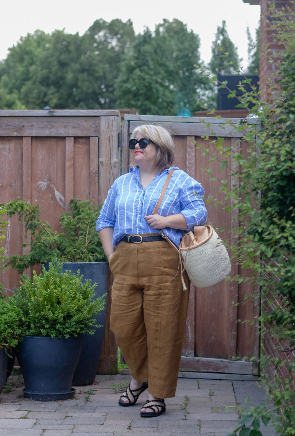 belted linen pants outfit with blue stripe linen shirt