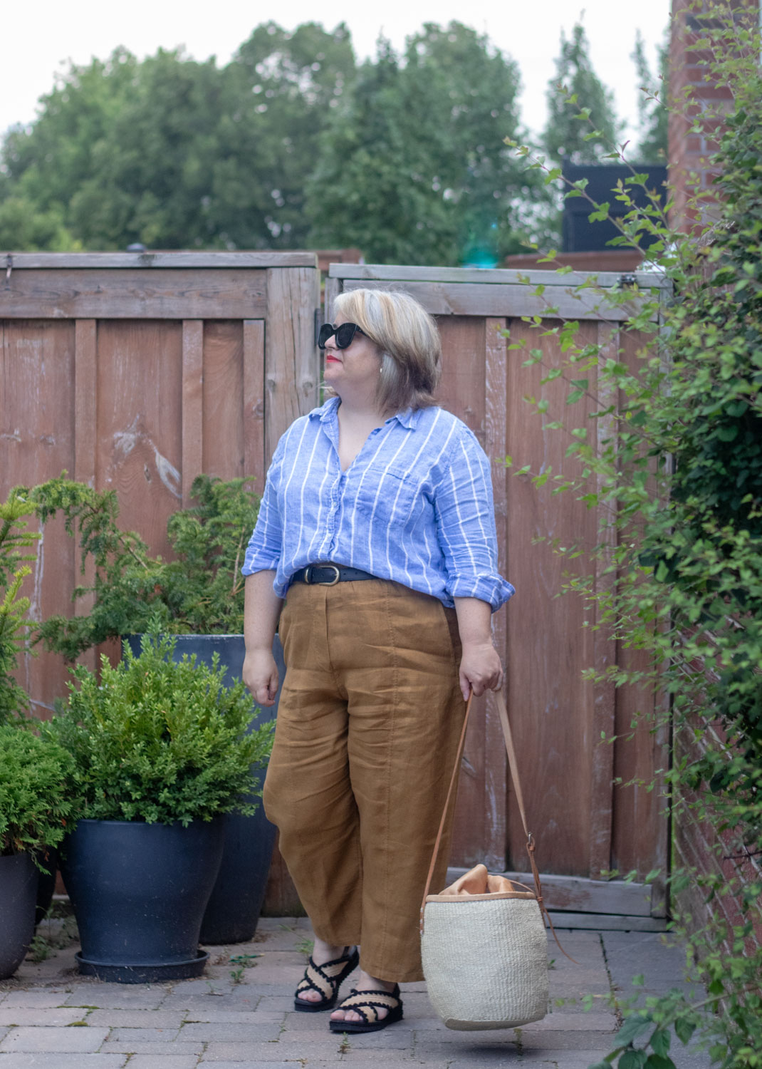 belted linen pants outfit with blue stripe linen shirt