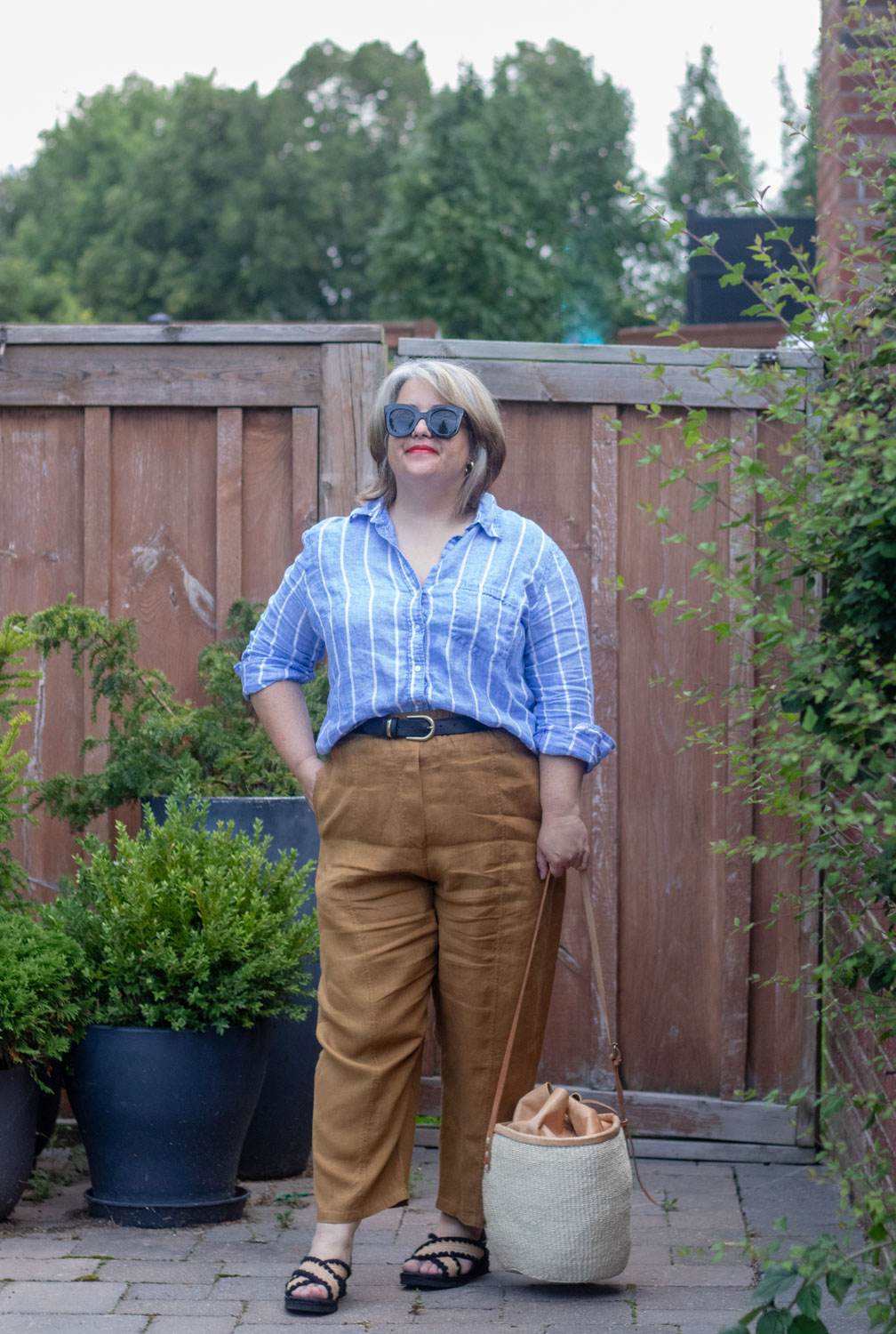 belted linen pants outfit with blue stripe linen shirt