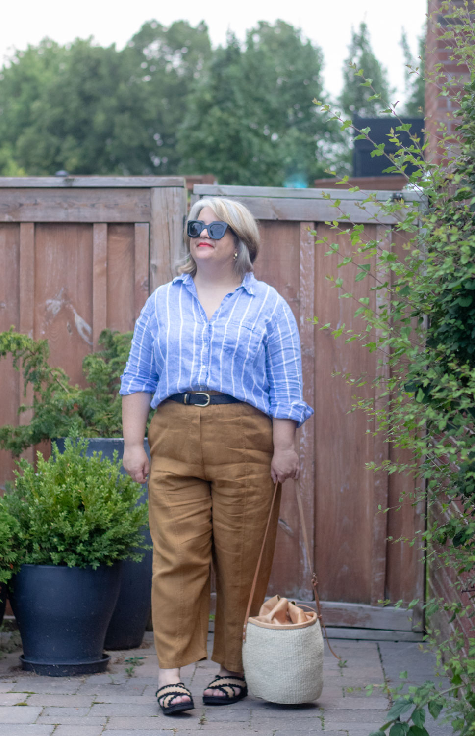 belted linen pants outfit with blue stripe linen shirt