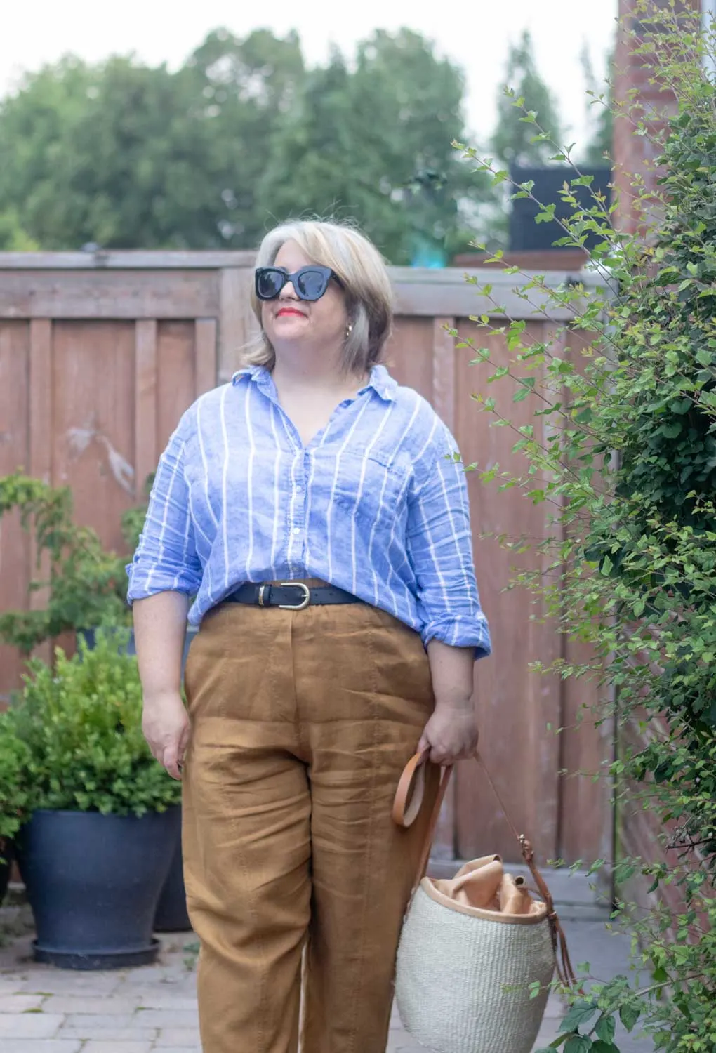 belted linen pants outfit with blue stripe linen shirt