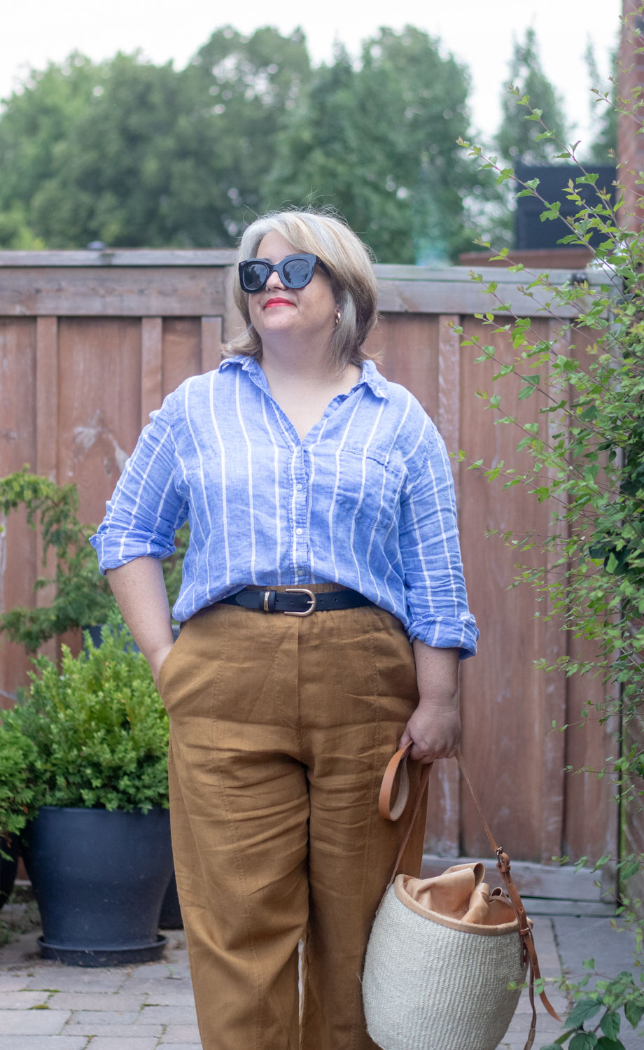 belted linen pants outfit with blue stripe linen shirt