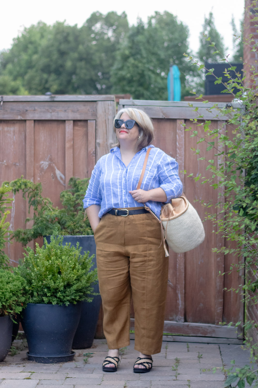 belted linen pants outfit with blue stripe linen shirt