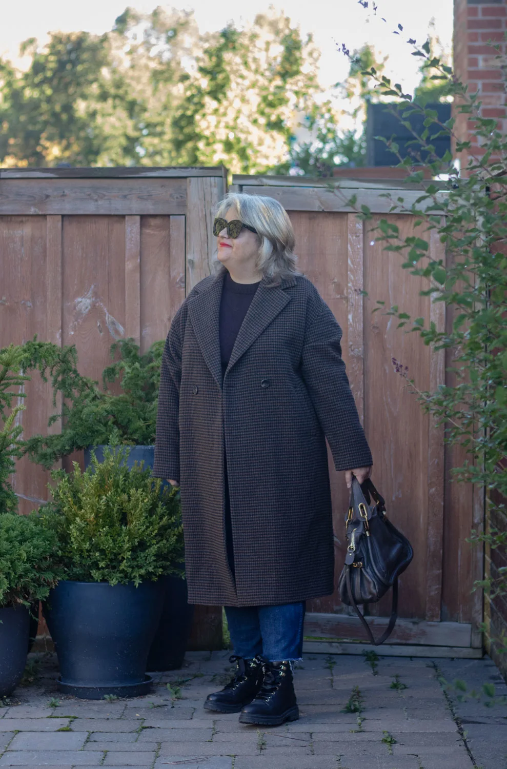 black and brown houndstooth coat outfit