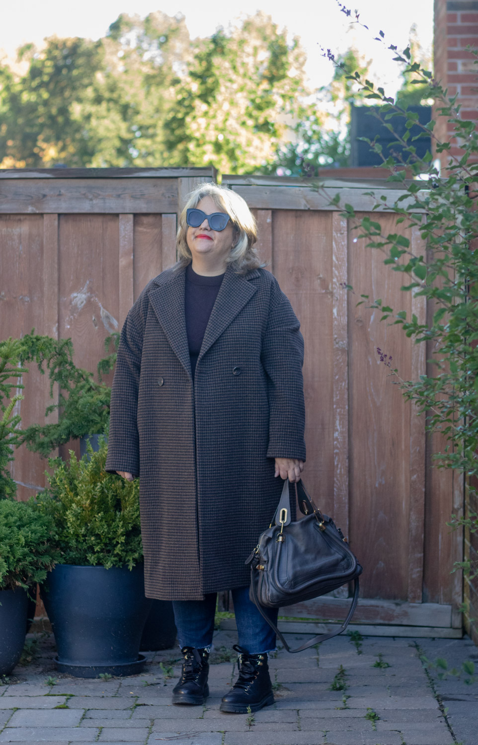 black and brown houndstooth coat outfit