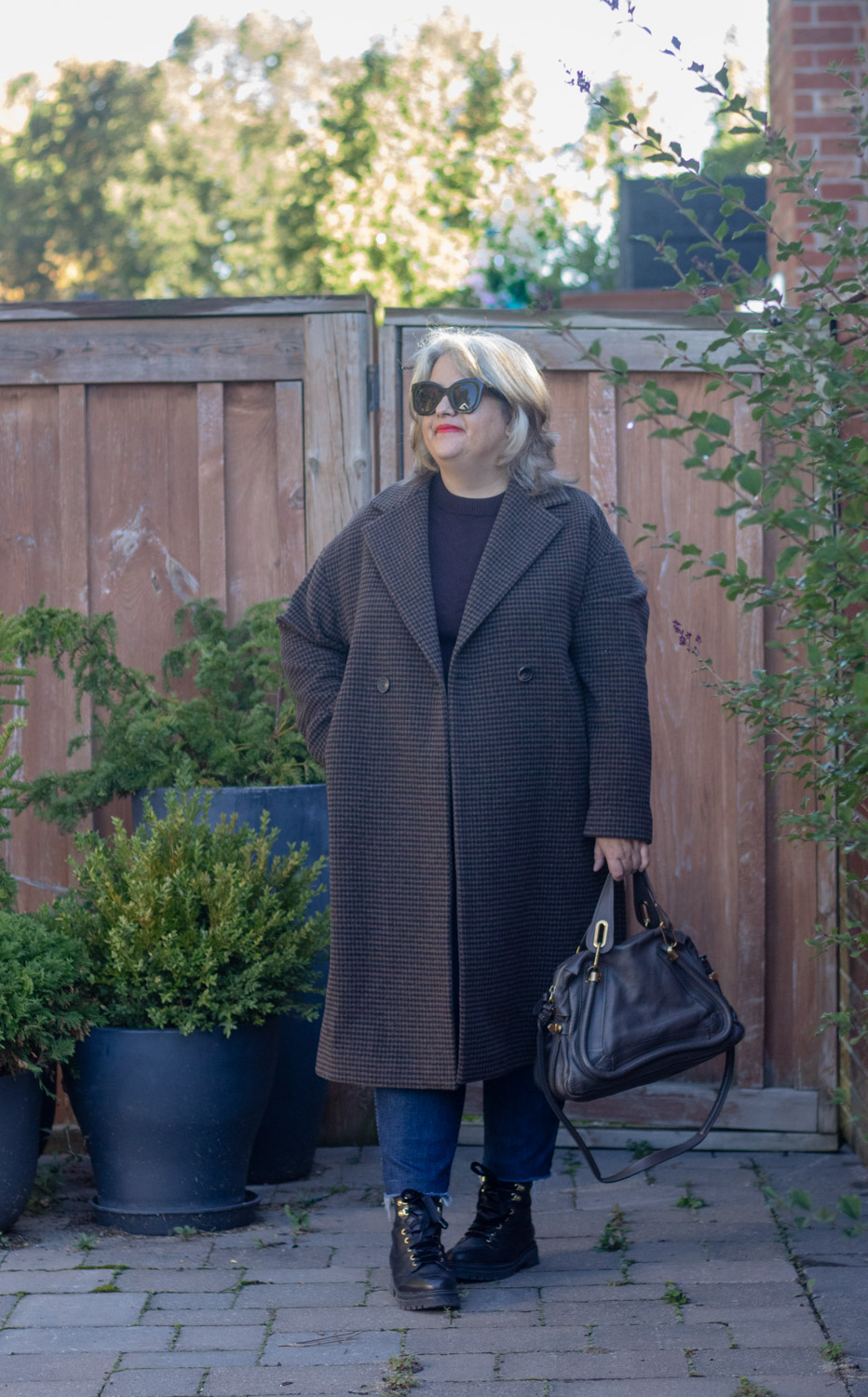 black and brown houndstooth coat outfit