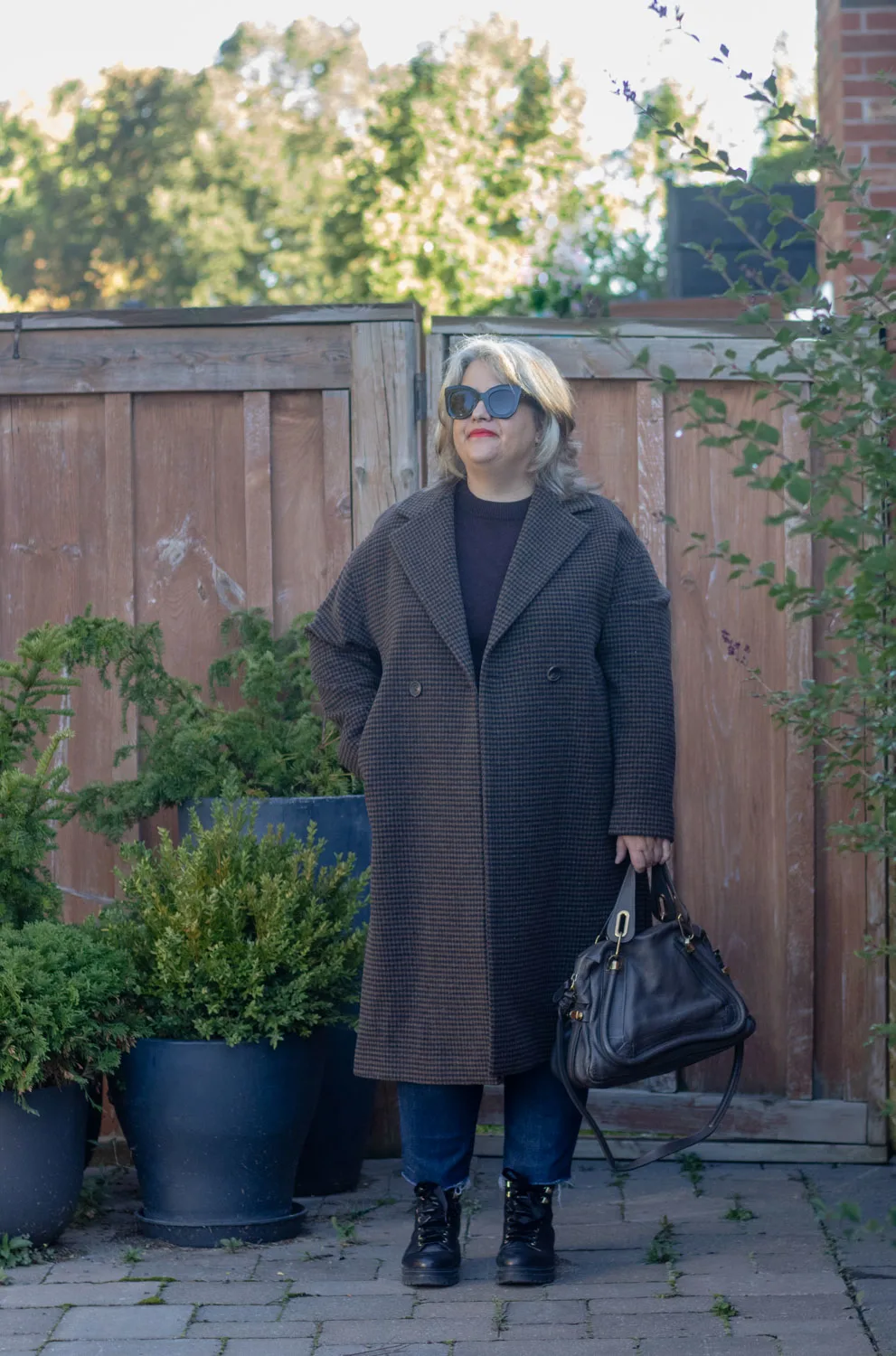 black and brown houndstooth coat outfit