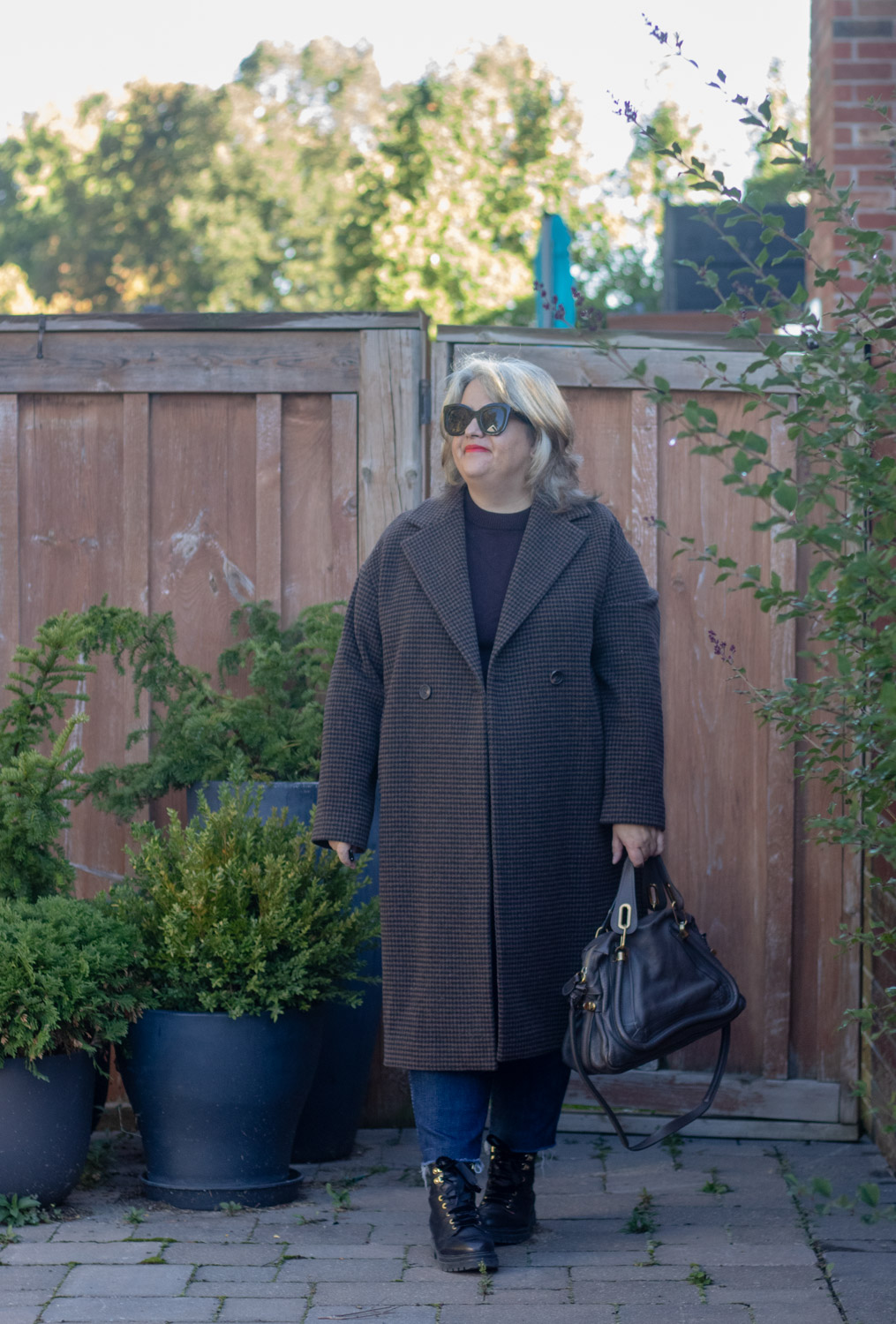 black and brown houndstooth coat outfit