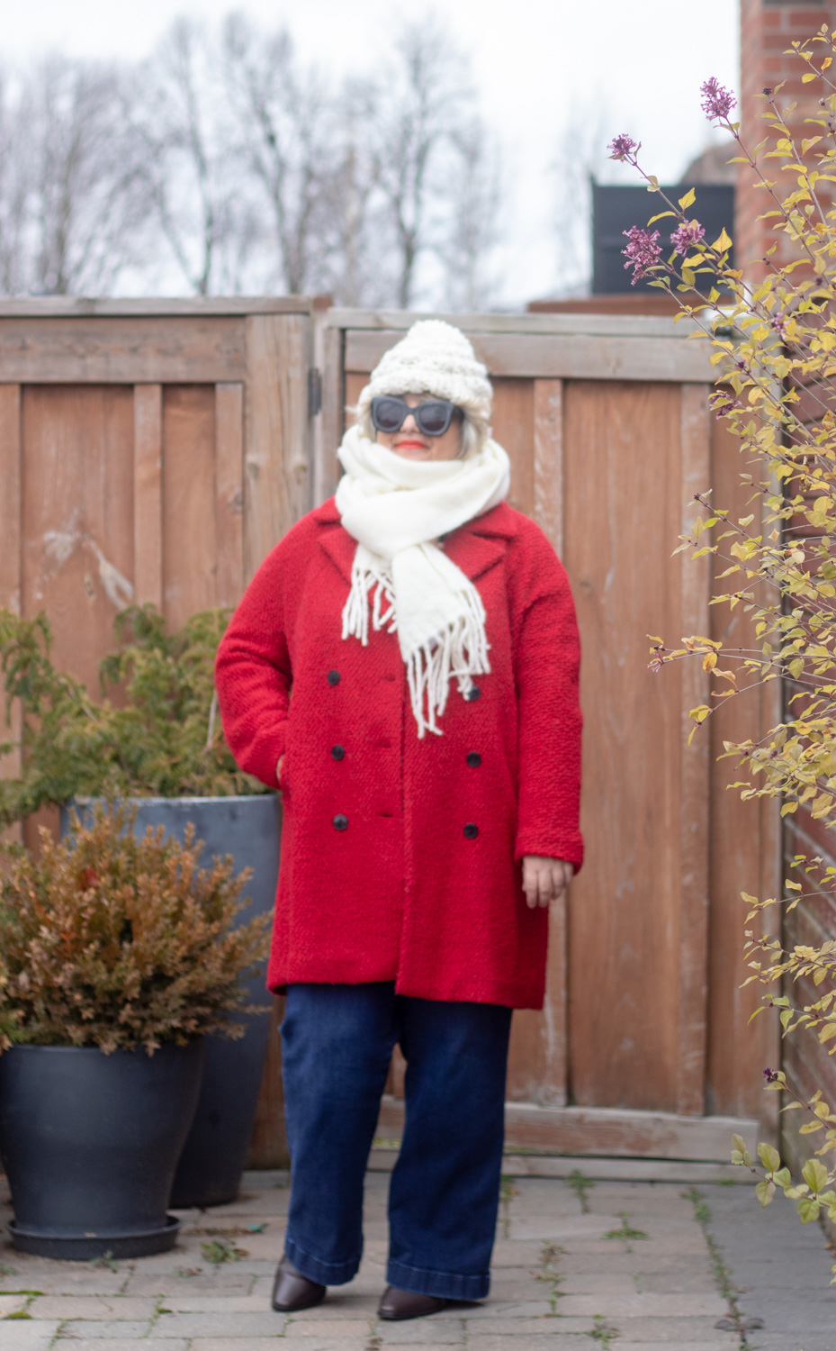 how to style a red coat with white accessories