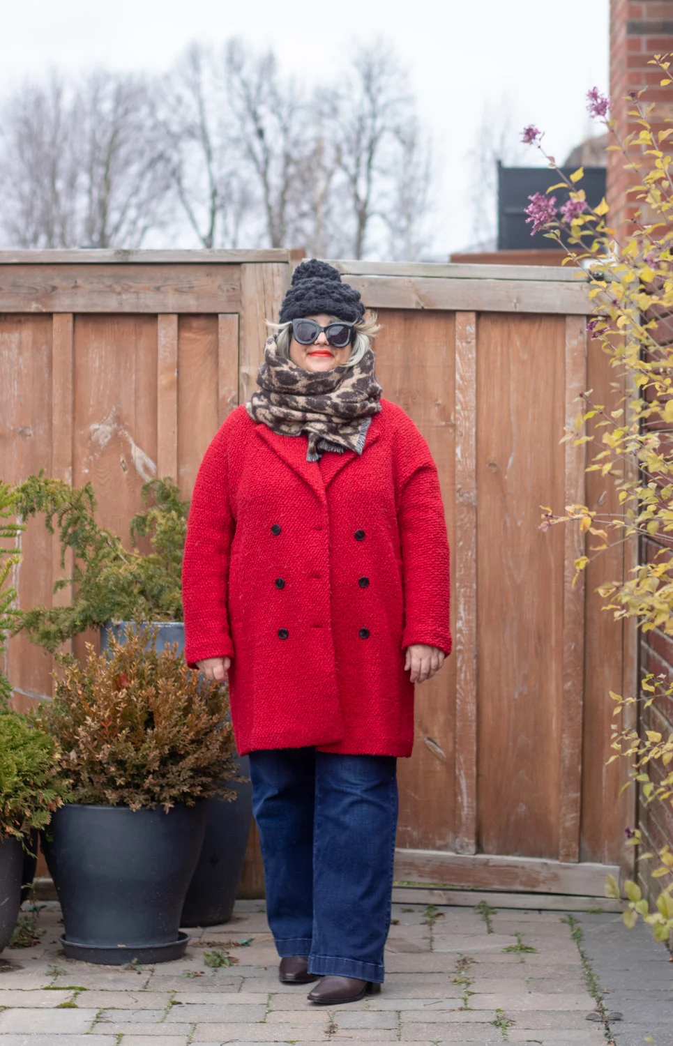 red coat with leopard scarf