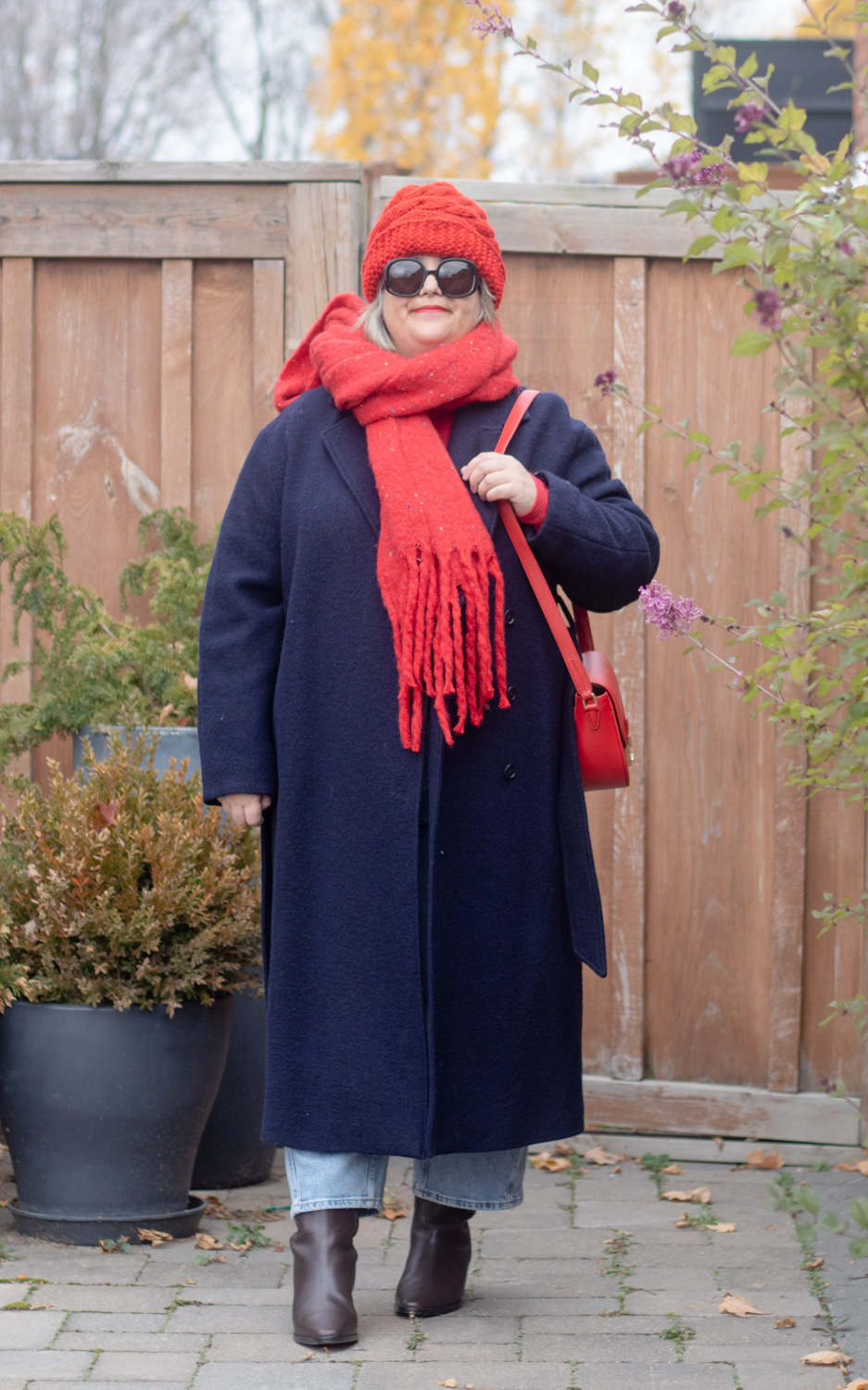 navy belted coat, red accessories, late fall outfit