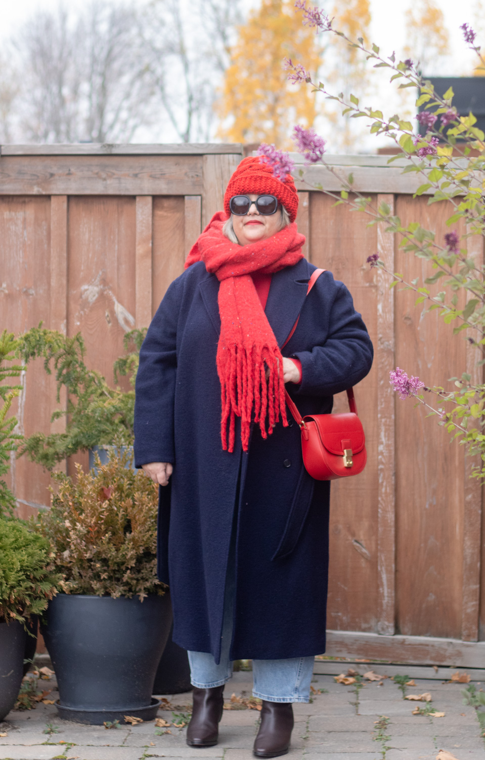 navy belted coat, red accessories, late fall outfit