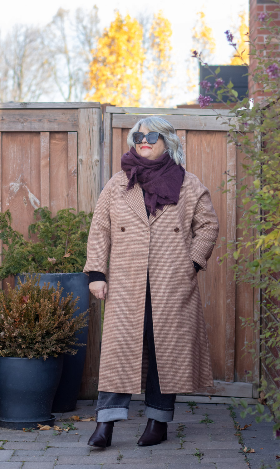 houndstooth coat with burgundy scarf