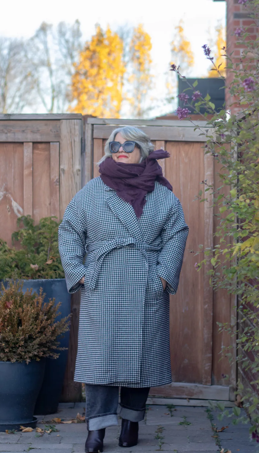 houndstooth coat with burgundy scarf