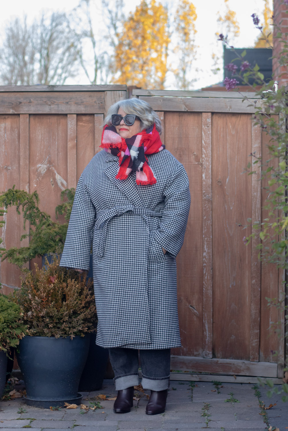 red scarf with houndstooth coat outfit